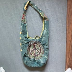 Rising International Canvas Sling Bag